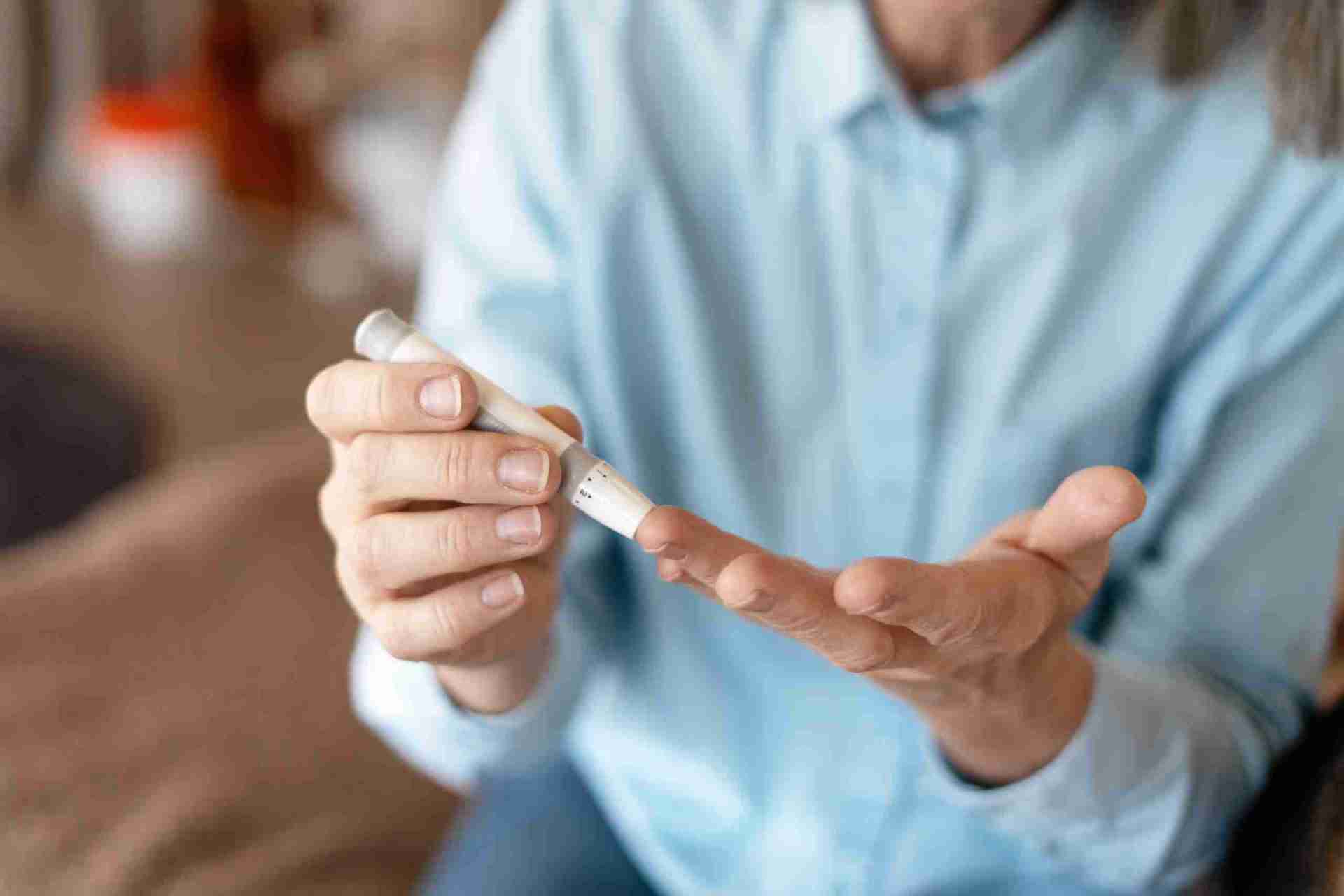 Woman in activewear stretching outdoors
