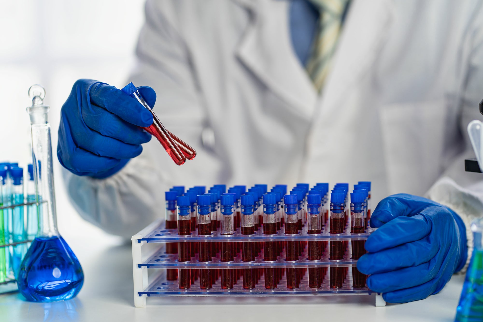 Woman in activewear stretching outdoors